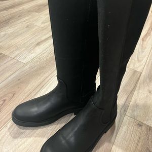 Mid-calf opal glow boots.